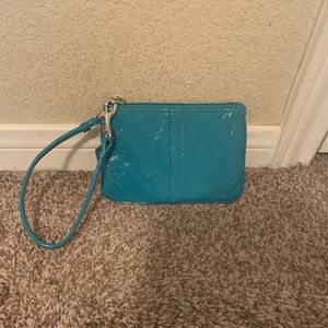 Coach little aqua/turquoise wallet/wristlet. Hardly used, basically brand new!